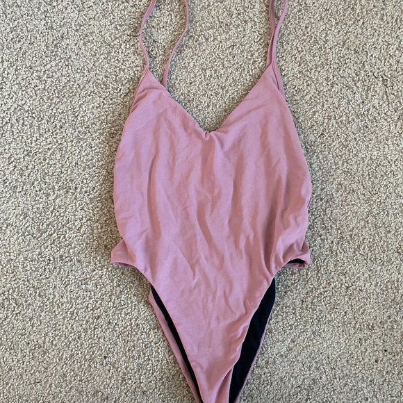 Jolyn Clothing Other - Jolyn Tie back Onesie